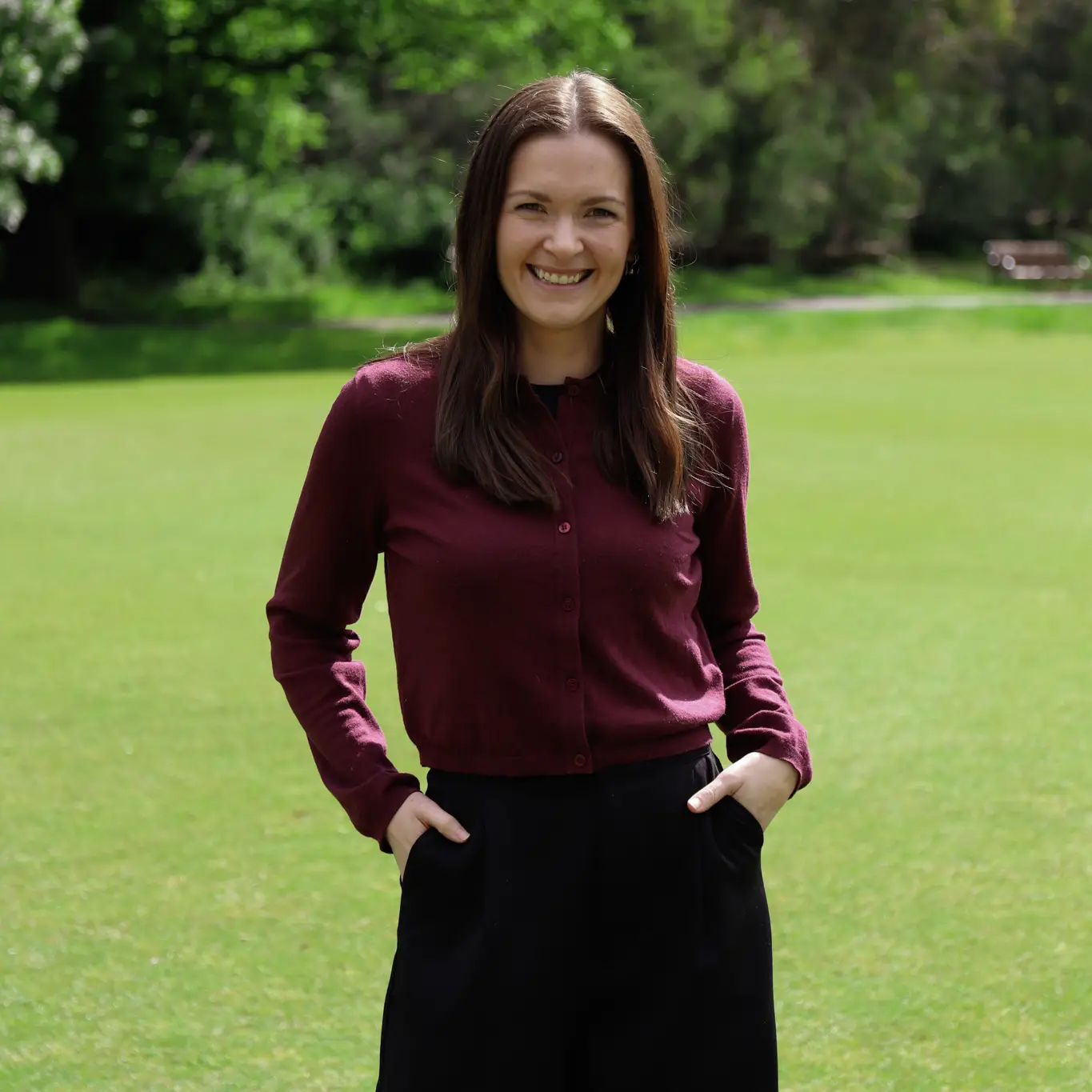 Georgie Gardiner hands in pockets smiling